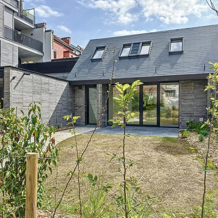 VDK Housing : Jolie maison neuve 1 chambre + jardin Ouest