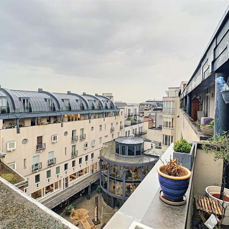 Sablon : Appartement Triplex 3 chambres + terrasse & parking