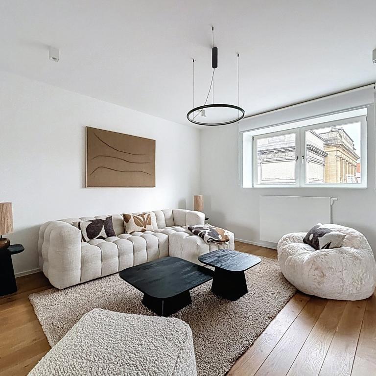 Cinquantenaire : Superbe duplex penthouse meublé + terrasse