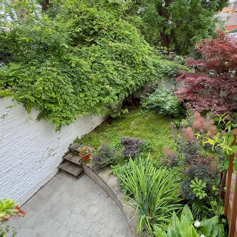 Cinquentenaire - Magnifique duplex avec jardin & garage