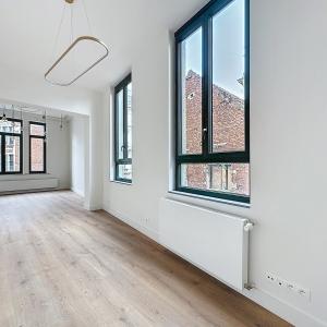 Sablon : Sublime appartement triplex penthouse remis à neuf