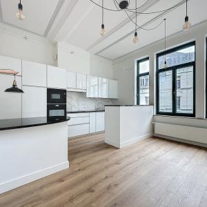 Sablon : Sublime appartement triplex penthouse remis à neuf