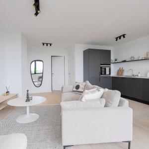 Magnifique duplex 3 ch. ±135m² + terr. ±26m² + jardin 71m²