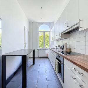 Cinquantenaire : Superbe duplex 2 chambres