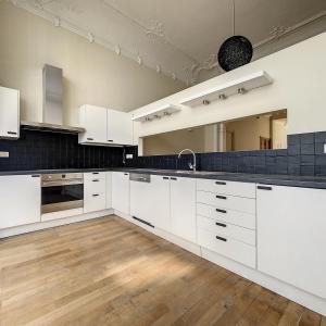 Châtelain/Stéphanie : Superbe duplex rdc avec jardin rénové