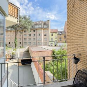 Cinquantenaire - Appartement 3 chambres avec terrasses.