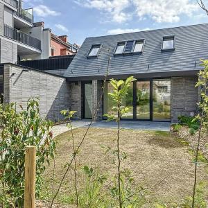 VDK Housing : Jolie maison neuve 1 chambre + jardin Ouest