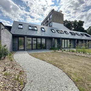 VDK Housing : Jolie maison neuve 1 chambre + jardin Ouest