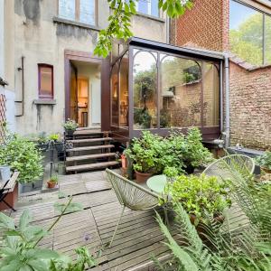 Lepoutre: Magnifique duplex rez-de-chaussée avec jardin 