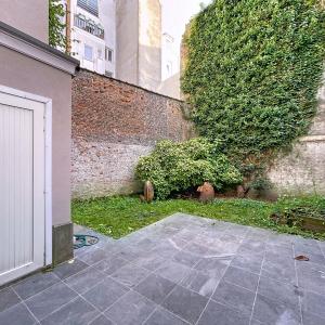 Place Poelaert : Beau rez-de-chaussée avec jardin meublé