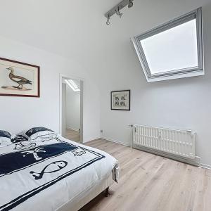 Roosevelt/ULB : Bel appartement duplex dernier étage