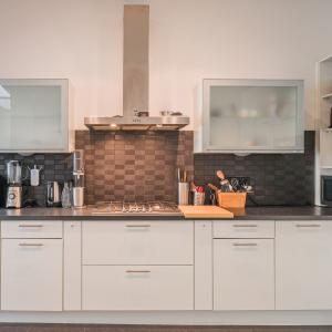 Square de Meeus, maison 238m² 6ch + duplex arr + garage