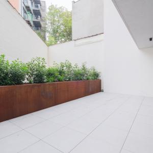 Rez-de-chaussée neuf de standing avec terrasse à Ixelles