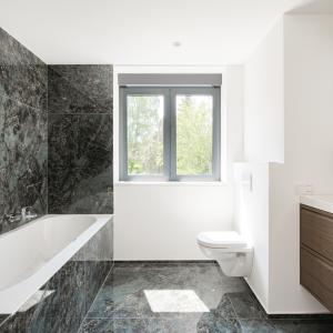 Saint-Job : Magnifique duplex RDC avec jardin neuf