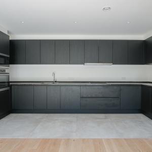Saint-Job : Magnifique duplex RDC avec jardin neuf