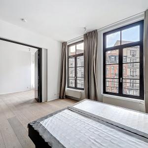 Sablon : Superbe appartement rénové, immeuble de caractère