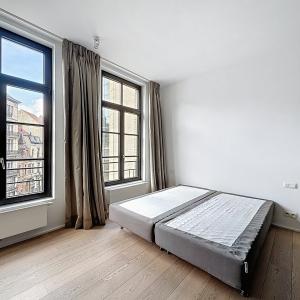 Sablon : Superbe appartement rénové, immeuble de caractère