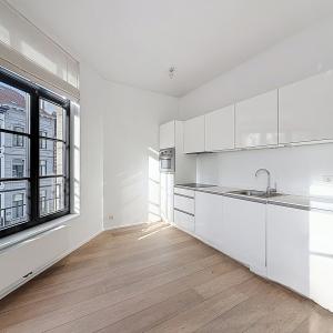 Sablon : Superbe appartement rénové, immeuble de caractère