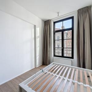 Sablon : Superbe appartement rénové, immeuble de caractère