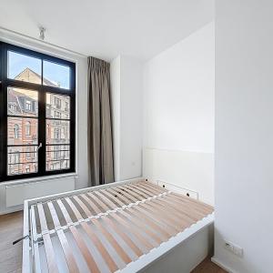 Sablon : Superbe appartement rénové, immeuble de caractère