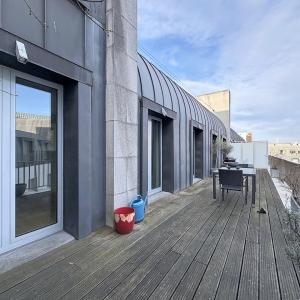 Sablon : Superbe appartement avec une grande terrasse