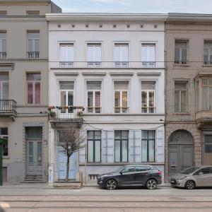 Botanique: Appartement de charme terrasse parking jardin