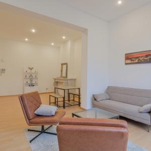 Botanique: Appartement de charme terrasse parking jardin