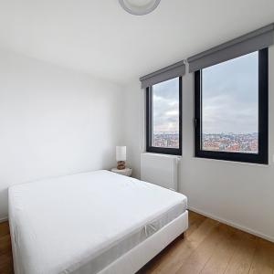 Cinquantenaire : Superbe duplex penthouse meublé + terrasse