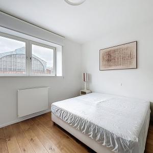 Cinquantenaire : Superbe duplex penthouse meublé + terrasse