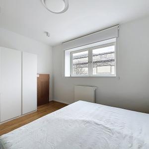 Cinquantenaire : Superbe duplex penthouse meublé + terrasse