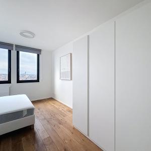 Cinquantenaire : Superbe duplex penthouse meublé + terrasse