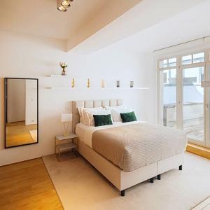 Châtelain : Appartement duplex 3 chambres + terrasses + pkg 