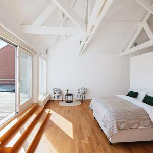 Châtelain : Appartement duplex 3 chambres + terrasses + pkg 