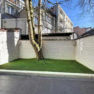 Chatelain : Beau rez-de-chaussée avec jardin !