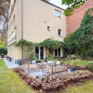 Magnifique triplex 4 CH avec jardin et parking