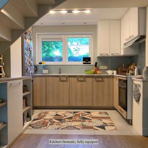 Magnifique triplex 4 CH avec jardin et parking