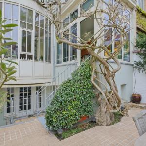 Place Brugmann : maison 6 ch + jardin orienté Sud