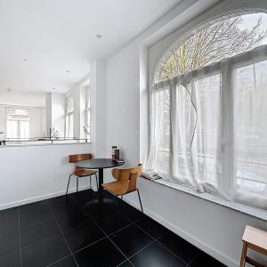 Pl. Brugmann/Lepoutre : Superbe appartement rez-de-chaussée 