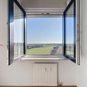 UCL : Lumineux appartement dernier étage avec une terrasse