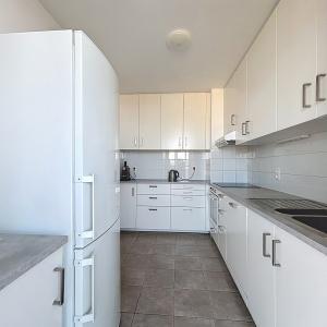 UCL : Lumineux appartement dernier étage avec une terrasse