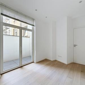 Pl. Brugmann/Lepoutre : Superbe appartement rez-de-chaussée 