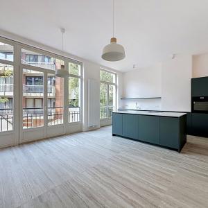 Churchill : Sublime duplex RDC avec jardin neuf