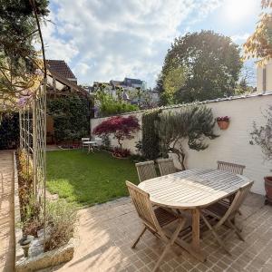 Place Brugmann : maison 6 ch + jardin orienté Sud