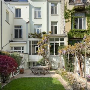Place Brugmann : maison 6 ch + jardin orienté Sud