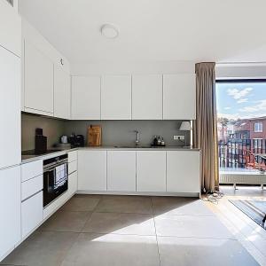 Maison communale d’Uccle : Appartement. 2ch + 3terr. + park.