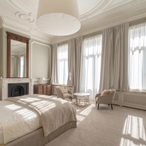 Sq. Marie-Louise : Magnifique maison de maitre 8ch + jardin