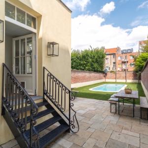 Sq. Marie-Louise : Magnifique maison de maitre 8ch + jardin