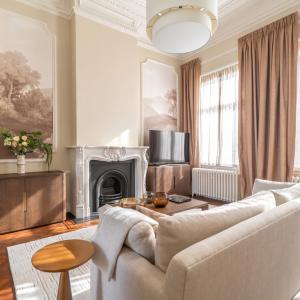 Sq. Marie-Louise : Magnifique maison de maitre 8ch + jardin