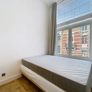Sablon : Appart. meublé 2 ch. – location 6 à 10 mois