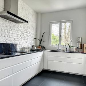 Cinquentenaire - Magnifique duplex avec jardin & garage